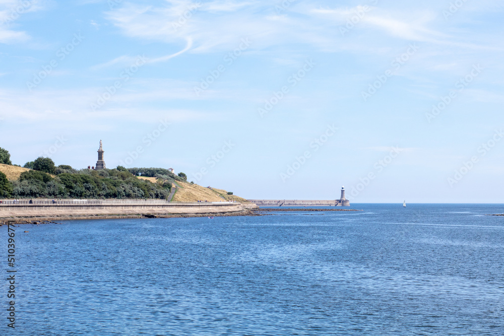 North Shields England - 05.08.2018: Shields Metro Ferry Crossing on a sunny day view from onboard boat - Collingwood Monument