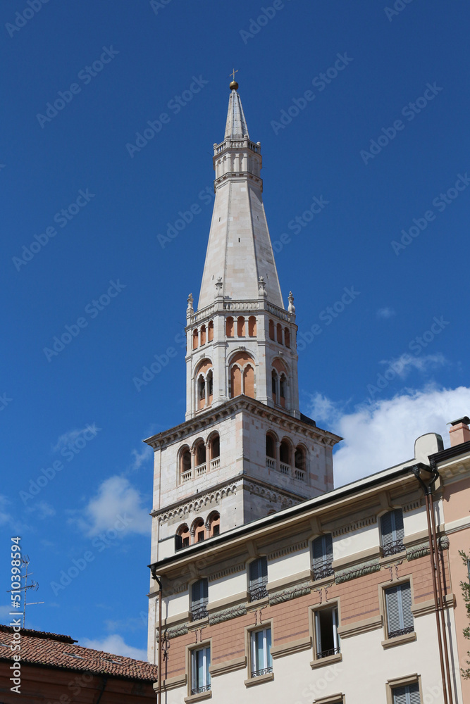 Modena, Italy, touristic city, Ghirlandina tower in the blue sky, Unesco