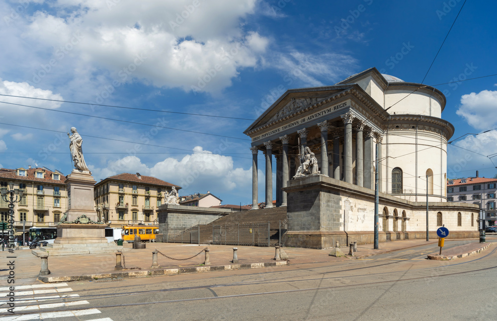Catholic Parish Church Gran Madre Di Dio in Piazza Gran Madre in Turin, Piedmont, Italy. Cityscape with blue sky and white clouds