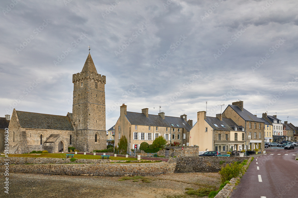Image of part of the village of Port Bail, Normandy France with the lower church and part of the bridge.