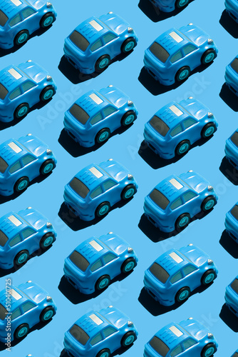 pattern of blue cars on blue background