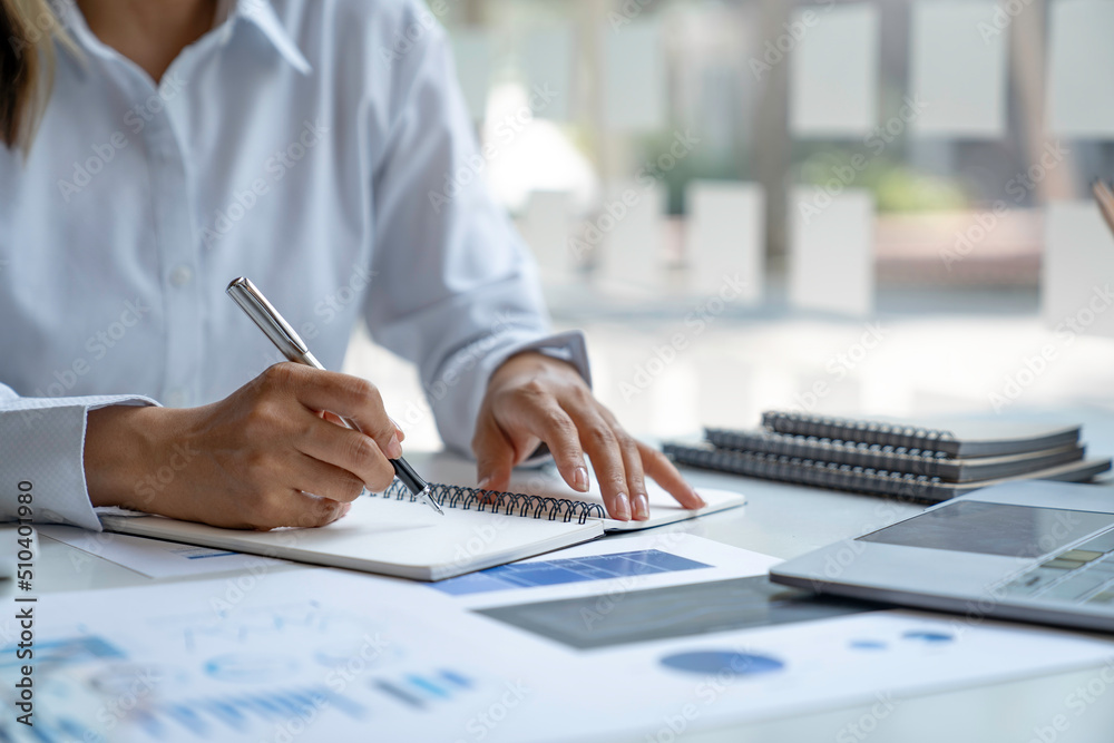 The professional investor, businesswoman Executives are working and analyzing project statistics result in report investment and planning strategic marketing, financial and accounting concept The professional investor, businesswoman Executives are working and analyzing project statistics result in report investment and planning strategic marketing, financial and accounting concept