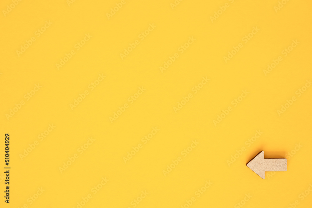 Business investment growth concept , Wooden arrows on yellow background. Space for your text