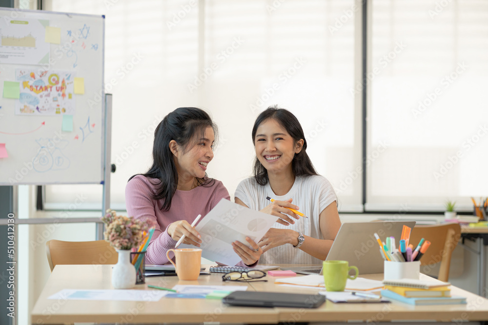 Asian young startup business group working together and sharing idea at modern office. Selective Focus Asian young startup business group working together and sharing idea at modern office. Selective Focus