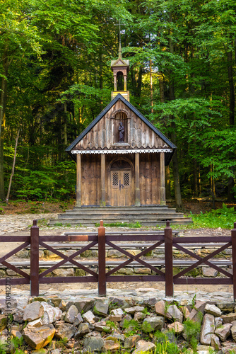 Traditional forest shrine of St. Francis in Swieta Katarzyna village near Bodzentyn at tourist path to Lysica peak in Swietokrzyskie Mountains in Poland