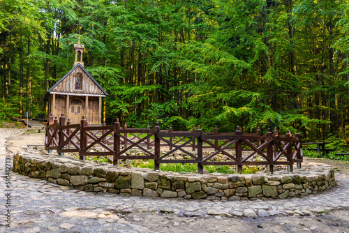 Traditional forest shrine and spring of St. Francis in Swieta Katarzyna village near Bodzentyn at tourist path to Lysica peak in Swietokrzyskie Mountains in Poland