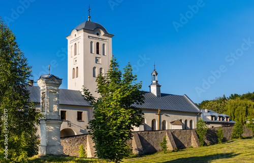 Fototapeta Naklejka Na Ścianę i Meble -  St. Catherine church and Benedictine convent in Swieta Katarzyna village near Bodzentyn in Swietokrzyskie Mountains in Poland