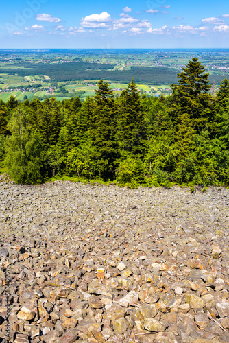 Panorama of Gory Swietokrzyskie Mountains and valleys with Goloborze Lysa Gora stone run slopes on Swiety Krzyz mount hilltop near Nowa Slupia village in Poland photo