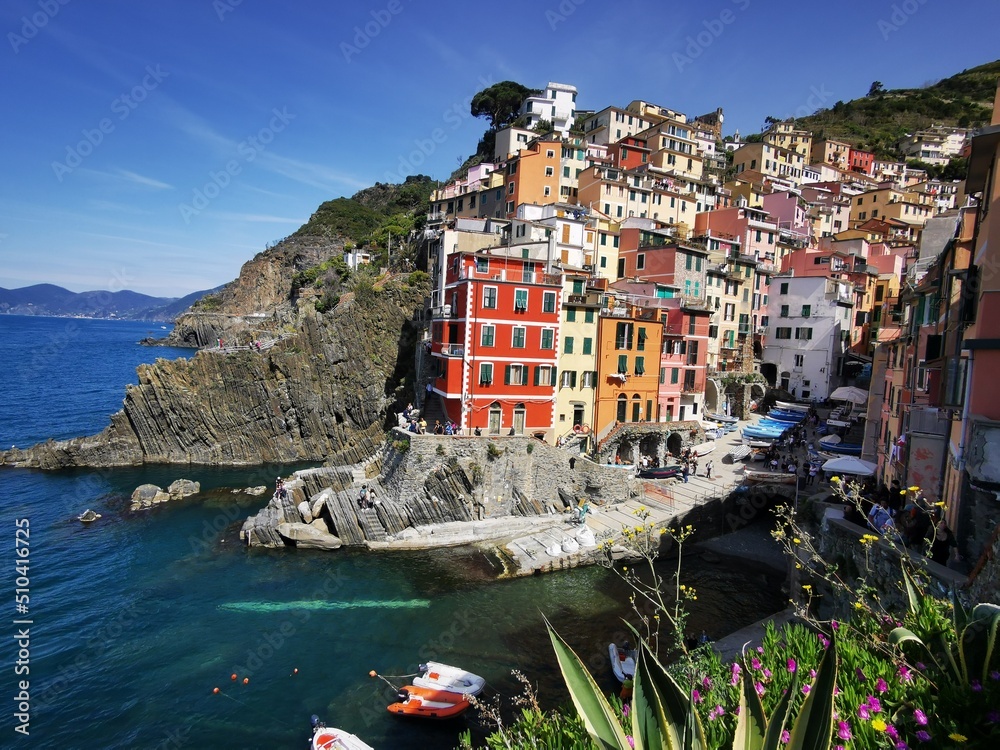Riomaggiore, Cinque Terre National Park, Liguria, Italy.
View of the colorful houses along the coastline of Cinque Terre area in Riomaggiore, Liguria, Italy.
Town of Riomaggiore, Liguria, Italy.
