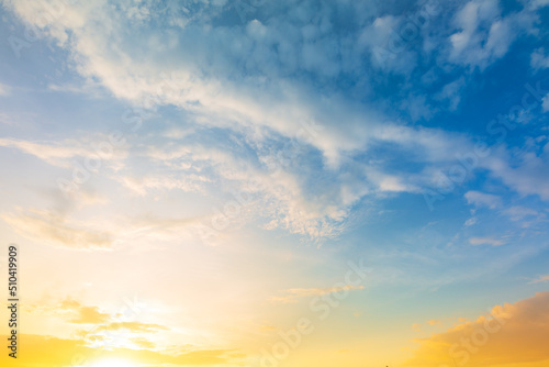 Orange sky and clouds background,Background of colorful sky concept, amazing sunset with twilight sky and clouds.