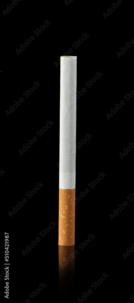 Cigarette on black background. Drugs are harmful to the lungs. Cigarette on black background. Drugs are harmful to the lungs.