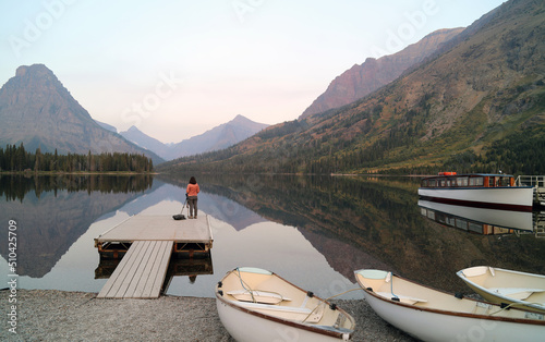 Photographer waiting for sunrise, Two Medicine Lake Glacier National Park, Montana USA
 photo