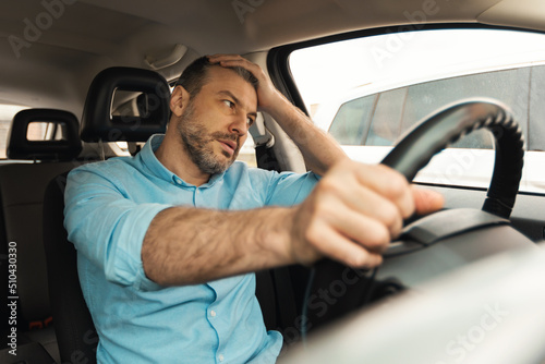Displeased Driver Man Driving Car Having Problem With Automobile
