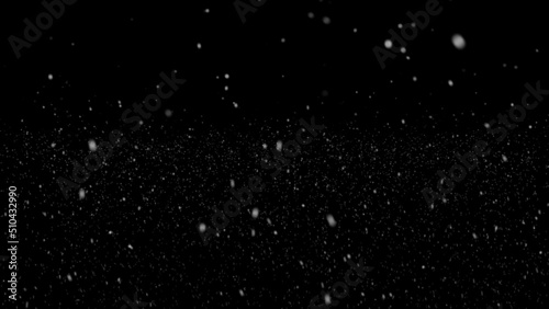 snowfall drops on black background. Falling real snowflakes shot on black background, matte, wide angle, animation with start and end, isolated, perfect for digital composition