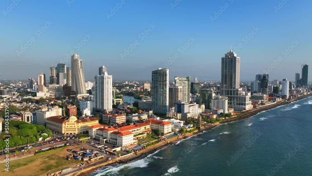Aerial Panning Shot Of Modern Apartments Buildings In City, Drone Flying Over Sea - Colombo, Sri Lanka Aerial Panning Shot Of Modern Apartments Buildings In City, Drone Flying Over Sea - Colombo, Sri Lanka