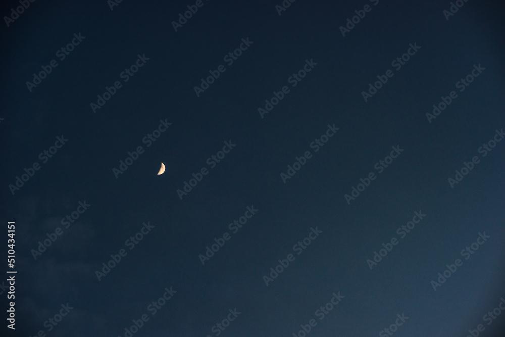 Moon view in the evening sky Moon view in the evening sky