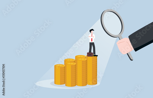 Checking personal income for taxation, verifying source of revenue, auditing concept. Government officer hand using magnifying glass to look at businessman standing on money stacks.