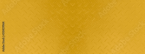 Gold metal surface, stainless steel plate with a seed pattern.surface, Rough texture, use for a background. Macro image. Concept of a stell gold seamless.
