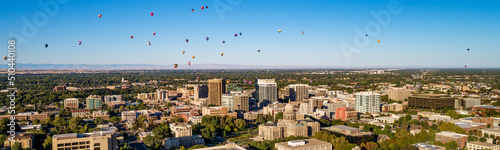 Hoy air balloons over Boise skyline Pano