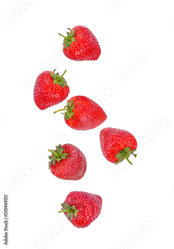 Strawberry falling in the air isolated n white background.