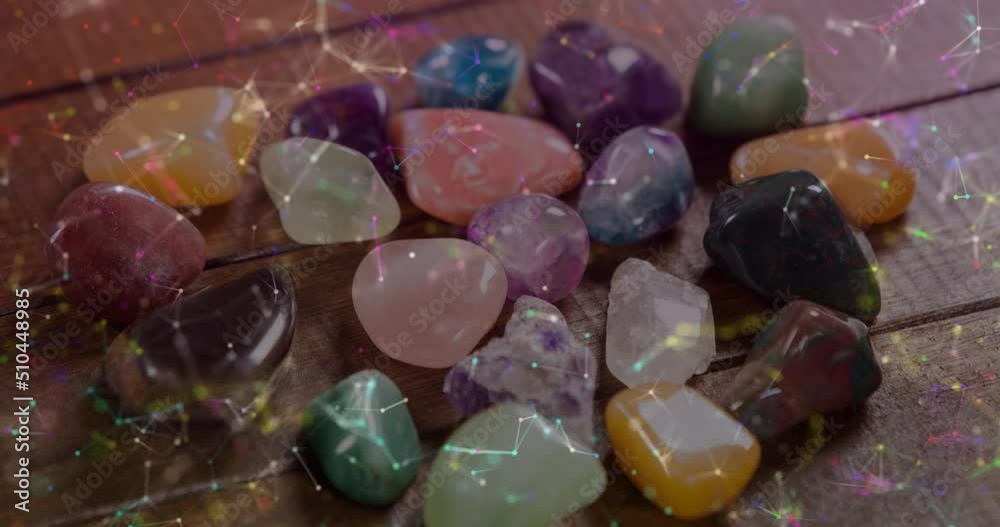 Animation of shapes and light spots over colourful stones Animation of shapes and light spots over colourful stones