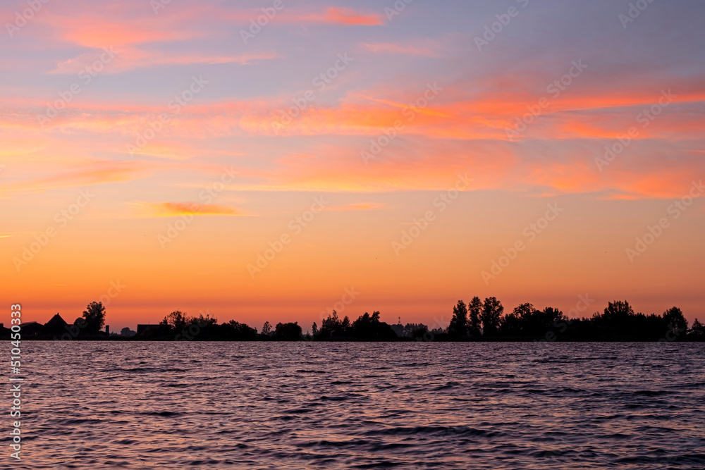Sunset at the Sneekermeer in Friesland the Netherlands