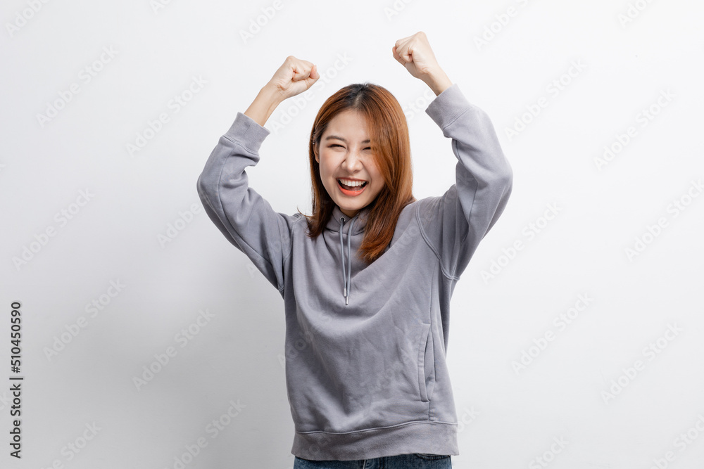 Portrait of beautiful Asian woman doing cheerful pose on isolated background, portrait concept used for advertisement and signage, isolated over white background, copy space. Portrait of beautiful Asian woman doing cheerful pose on isolated background, portrait concept used for advertisement and signage, isolated over white background, copy space.
