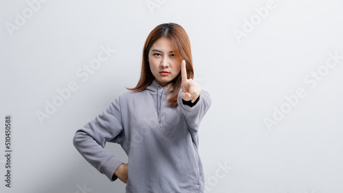 Portrait of a beautiful Asian woman gesturing on isolated background, portrait concept used for advertisement and signage, isolated over white background, copy space.