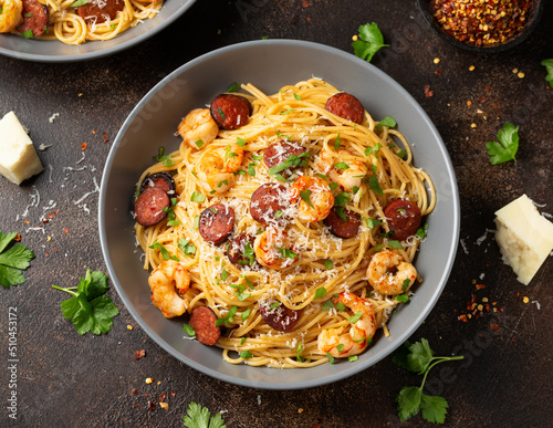 Prawn and chorizo pasta with cheese and herbs