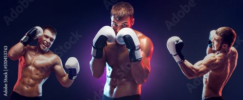 Two boxers boxing on dark background with copy space. Sport concept © zamuruev