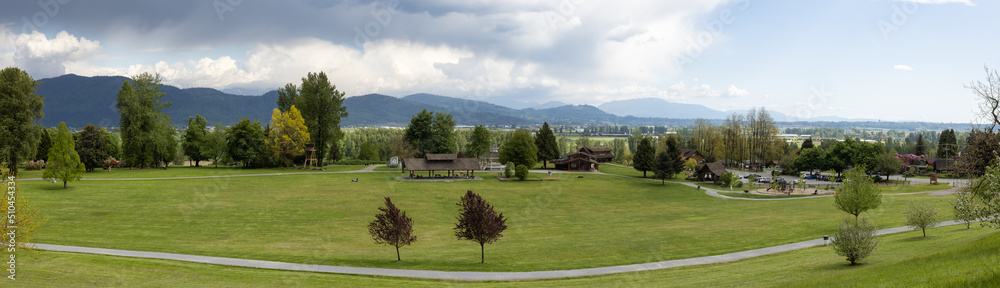 Panoramic View of Fraser River Heritage Park. Cloudy Spring Season Sky. Fraser River Heritage Park, Mission, British Columbia, Canada.