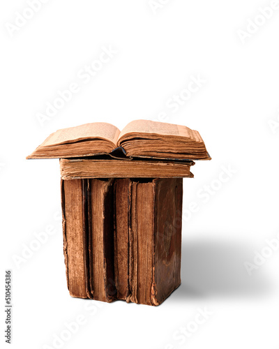 Obraz na płótnie Open pages of Torah on stack of old worn shabby Jewish books in leather binding on white background. Closeup. Selective focus. w salonie