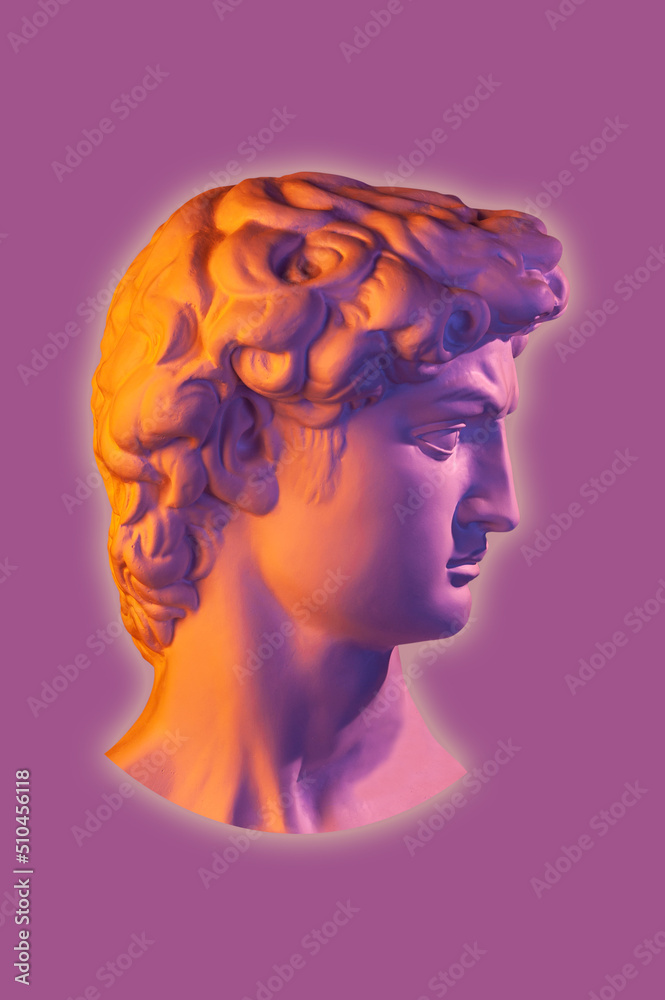 Gypsum copy of head statue David for artists. Plaster face of sculpture youth David before fight with giant Goliath by Michelangelo in bright neon color. Template design for dj, fashion, poster, zine. Gypsum copy of head statue David for artists. Plaster face of sculpture youth David before fight with giant Goliath by Michelangelo in bright neon color. Template design for dj, fashion, poster, zine.