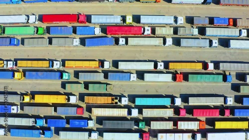 A huge queue of trucks loaded with grain crops in a blocked Ukrainian port. Humanitarian crisis due to the war.