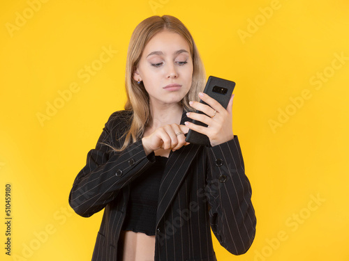 Girl with smartphone. A wom...