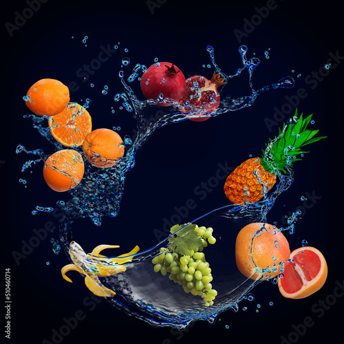Fototapeta Naklejka Na Ścianę i Meble -  Panorama, wallpaper with fruits in the water - fresh pomegranate, orange, pineapple, grape, grapefruit are full of vitamins for the diet