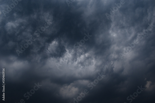 Dark rainy thunderstorm clouds grey color horizontal image photo
