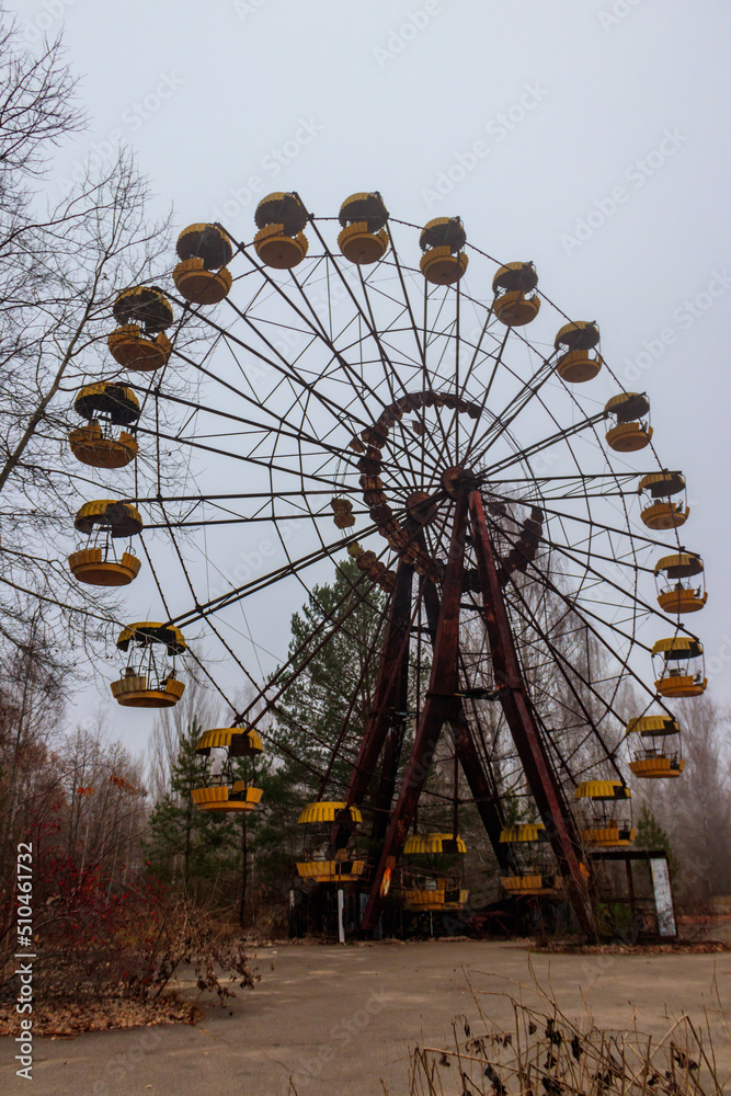 Abandoned Ferris Wheel in the amusement park of ghost town Pripyat in Chernobyl Exclusion Zone, Ukraine Abandoned Ferris Wheel in the amusement park of ghost town Pripyat in Chernobyl Exclusion Zone, Ukraine