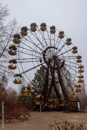 Abandoned Ferris Wheel in the amusement park of ghost town Pripyat in Chernobyl Exclusion Zone, Ukraine