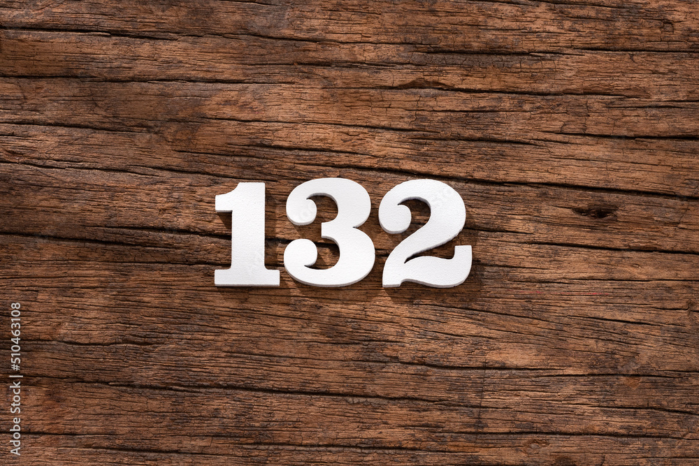 Number 132 - piece on rustic wood background Number 132 - piece on rustic wood background