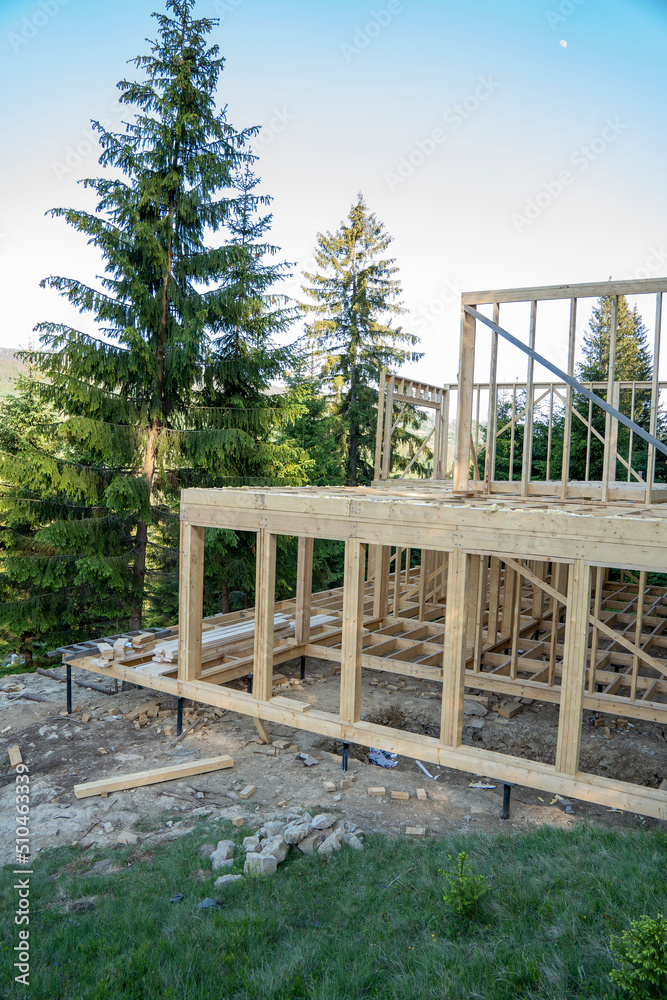 Energy efficient frame house. New framing construction of a house Energy efficient frame house. New framing construction of a house
