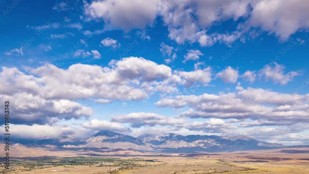 Time Lapse looking west across the Owens Valley and town of Bishop towards the Sierra Nevada Mountains in California Time Lapse looking west across the Owens Valley and town of Bishop towards the Sierra Nevada Mountains in California