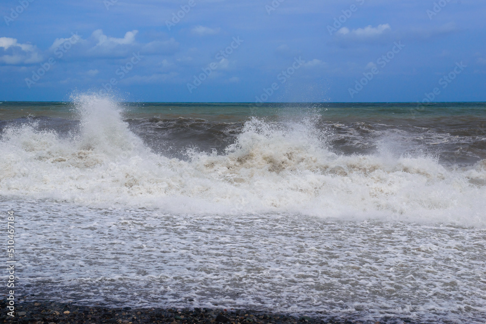Stormy sea waves breaking near the coast Stormy sea waves breaking near the coast