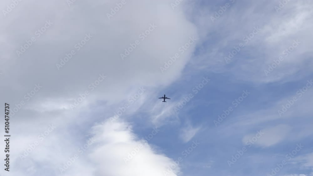 Airplane flying in the blue sky, real time video Airplane flying in the blue sky, real time video