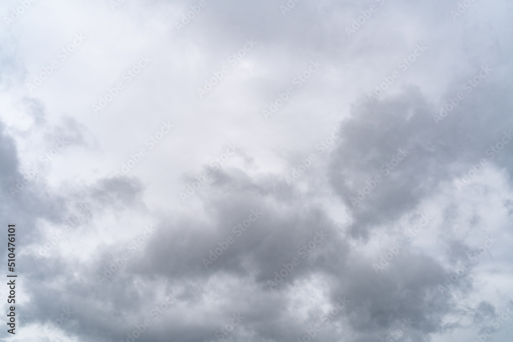 Sky with stormy gray cumulus clouds during rainy gloomy weather as background. Sky with stormy gray cumulus clouds during rainy gloomy weather as background.