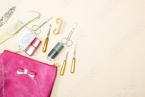 manicure and pedicure equipment for nail bar set on pink background top view mockup
