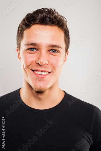 Portrait of young man in black shirt