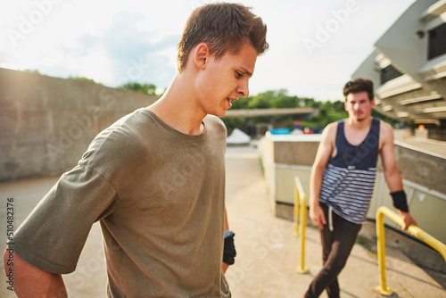 Teenage free runners preparing