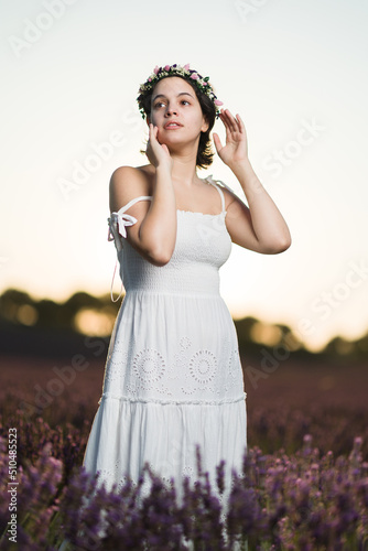 Summer lavender field nature. happy Young hispanic woman in purple flowers meadow landscape