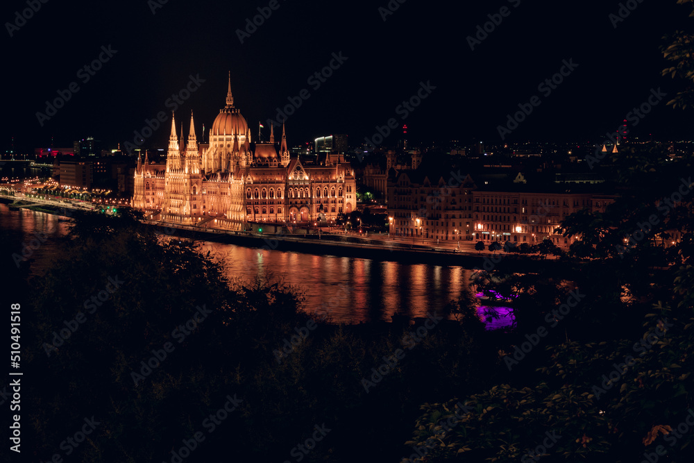 Hungarian Parliament and Danube river at night, Budapest, Hungary.